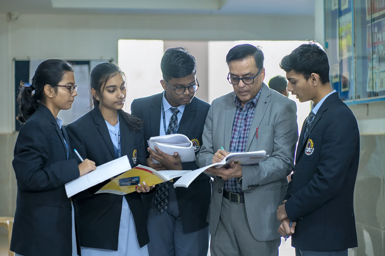 Secondary students receiving personalized academic mentorship and board preparation
